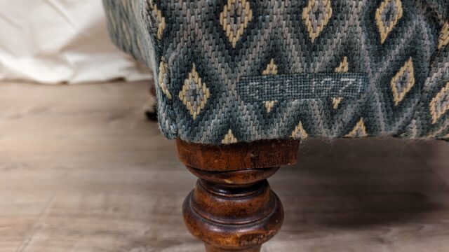 detail-of-hand-embroidered-upholstery-fabric-on_re-upholstered-chair-hare-in-the-chair[1]
